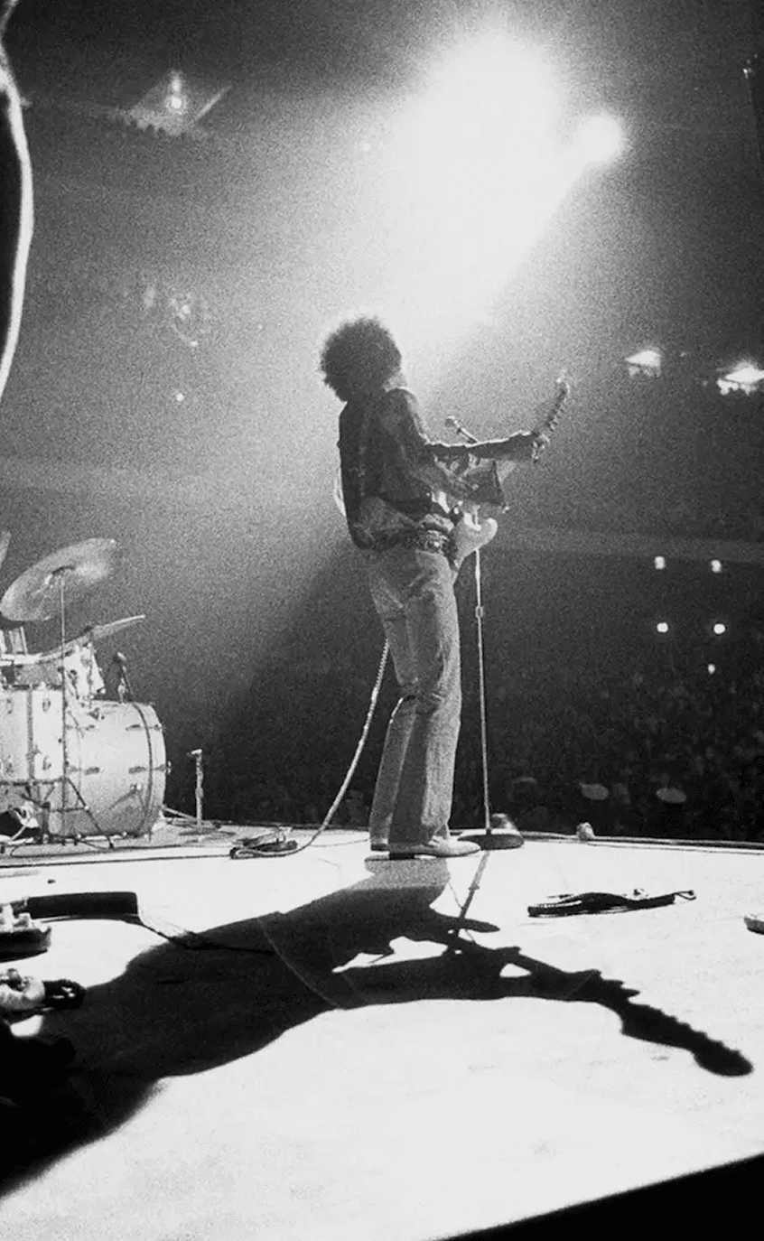 Jimi Hendrix performing